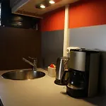 Loger à *